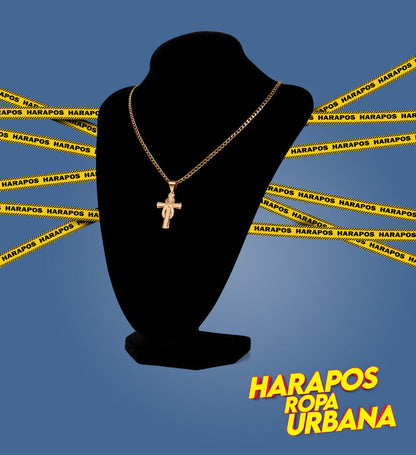 Cadena acero y dije cruz lazo enredado dorada