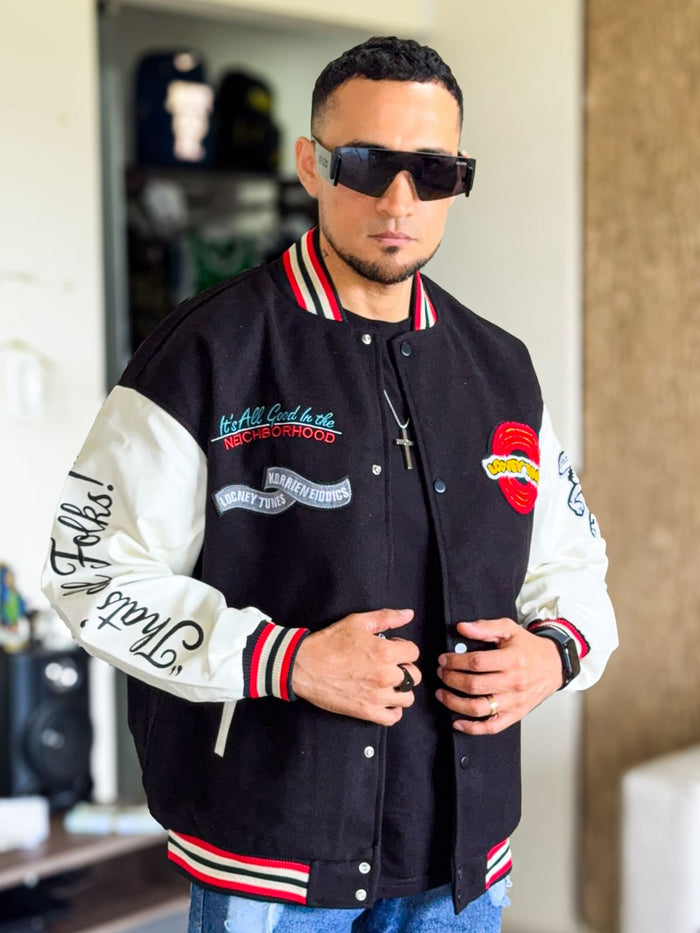 Chaqueta Bomber Premium Lonney Toons de Paño, mangas de cuero y detalles bordados
