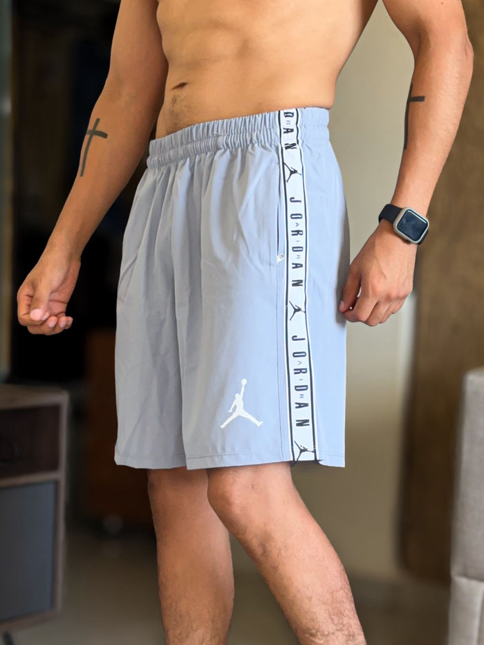 Short jordan air plomo franja lateral